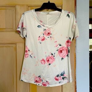 Ealey Fushi women’s shirt size small.